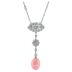 Perla Concha Rosa Natural 12,98 cts en Colgante de Platino con Diamantes / Informe GIA