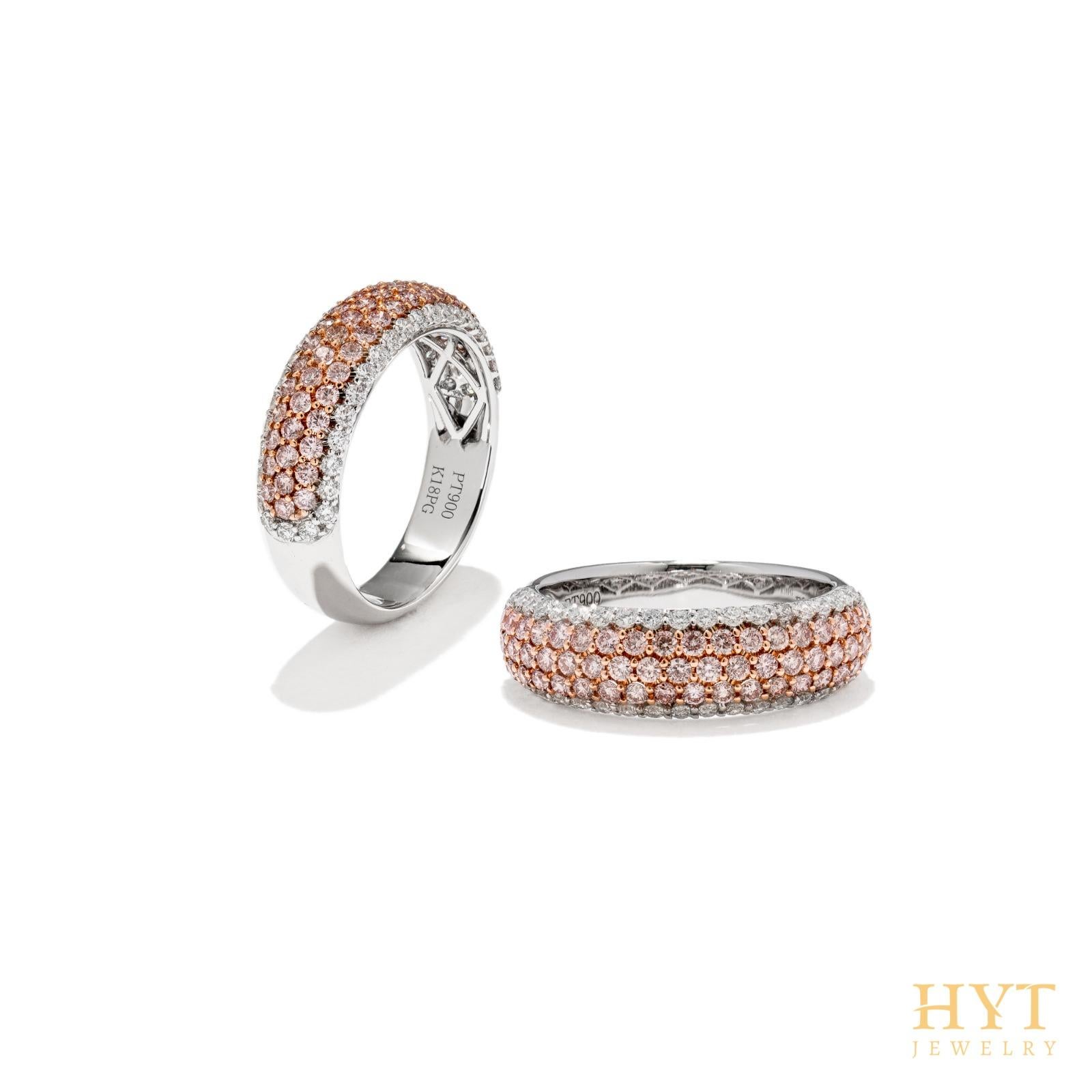 This delicate ring band features a lustrous natural Pink Diamonds at the forefront of its design. The spectacular hues of the pink diamonds are perfectly accentuated by the PT900 platinum and 18 Karat pink gold setting and elegant white diamond