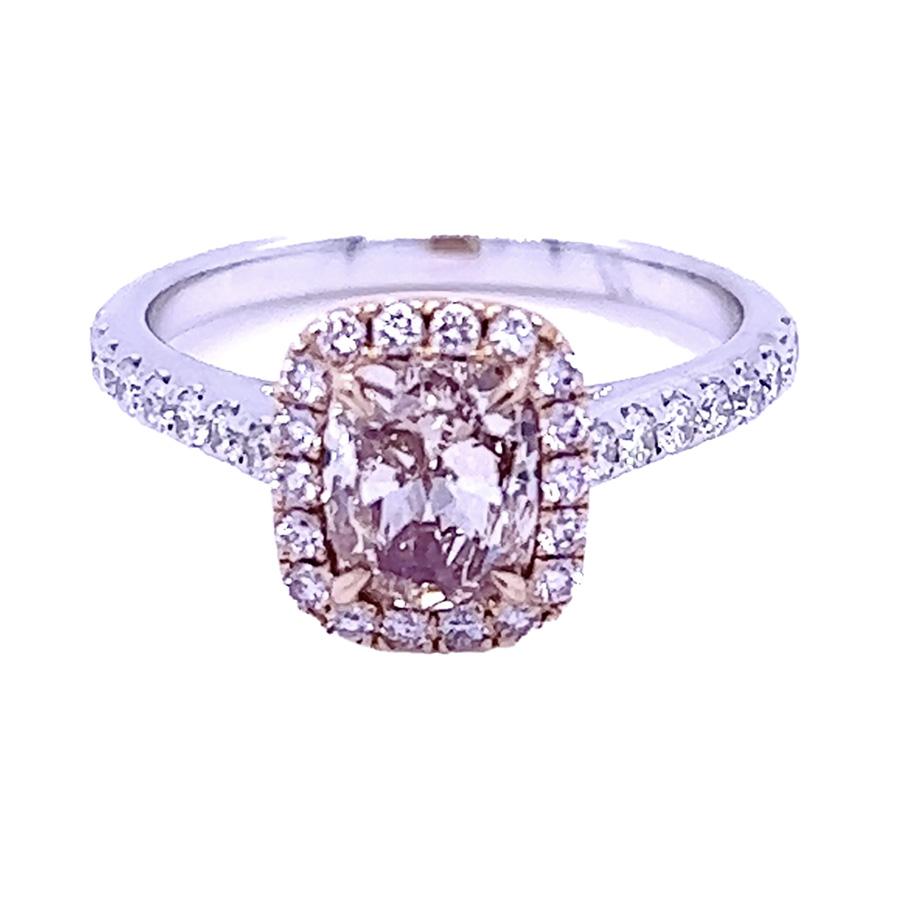 18k Ring with GIA certified natural Fancy Pink-Brown cushion cut diamond weighing 1.10 carats and 18 Fancy Pink round diamonds weighing 0.17 carats and 16 D color rround diamonds weighing 0.24 carats. 3.90 grams