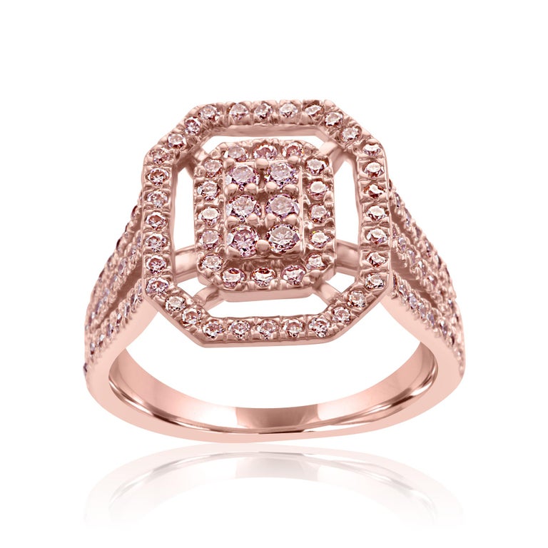 Natural Fancy Pink Diamond Round SI clarity 1.12 Carat set in 14K Rose Gold Triple Shank Fashion Cocktail Right Hand Ring.

Total Diamond Weight 1.12 Carat

Style available in different price ranges. Prices are based on your selection of 4C's i.e