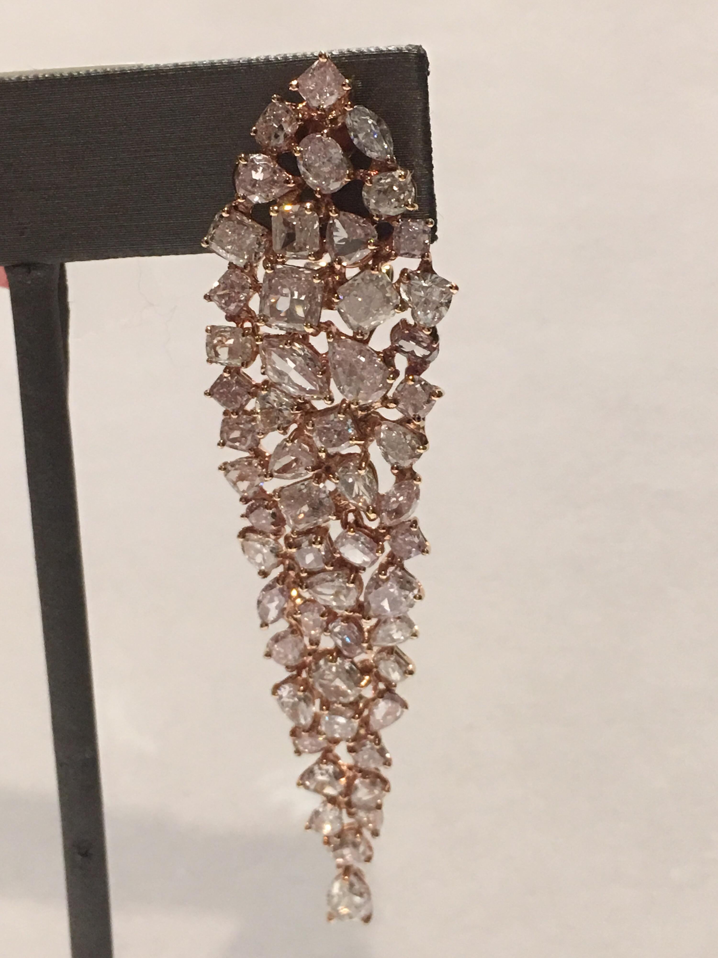 Natural Pink Diamond Earrings set in 18K Pink Gold. Total Pink Diamonds is 18.98 Carat. Total Gold weight is 19.50 Gram.The Earring is Hand crafted and one of a kind.