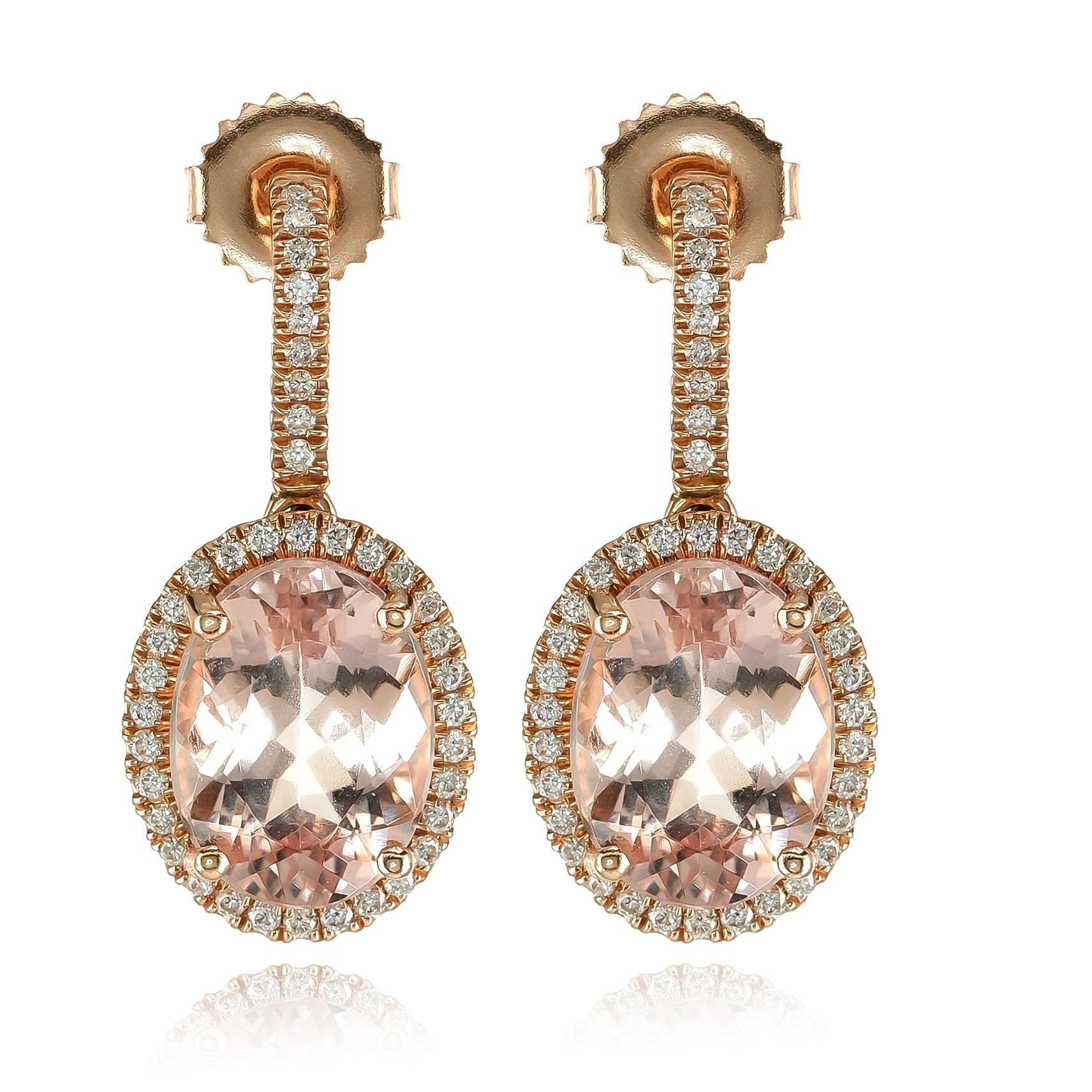 Discover the delicate beauty of these natural morganite earrings, featuring a stunning 7.75-carat morganite stone set in warm 14K rose gold. Accented by 0.47 carats of sparkling diamonds, these earrings radiate elegance and sophistication, perfect