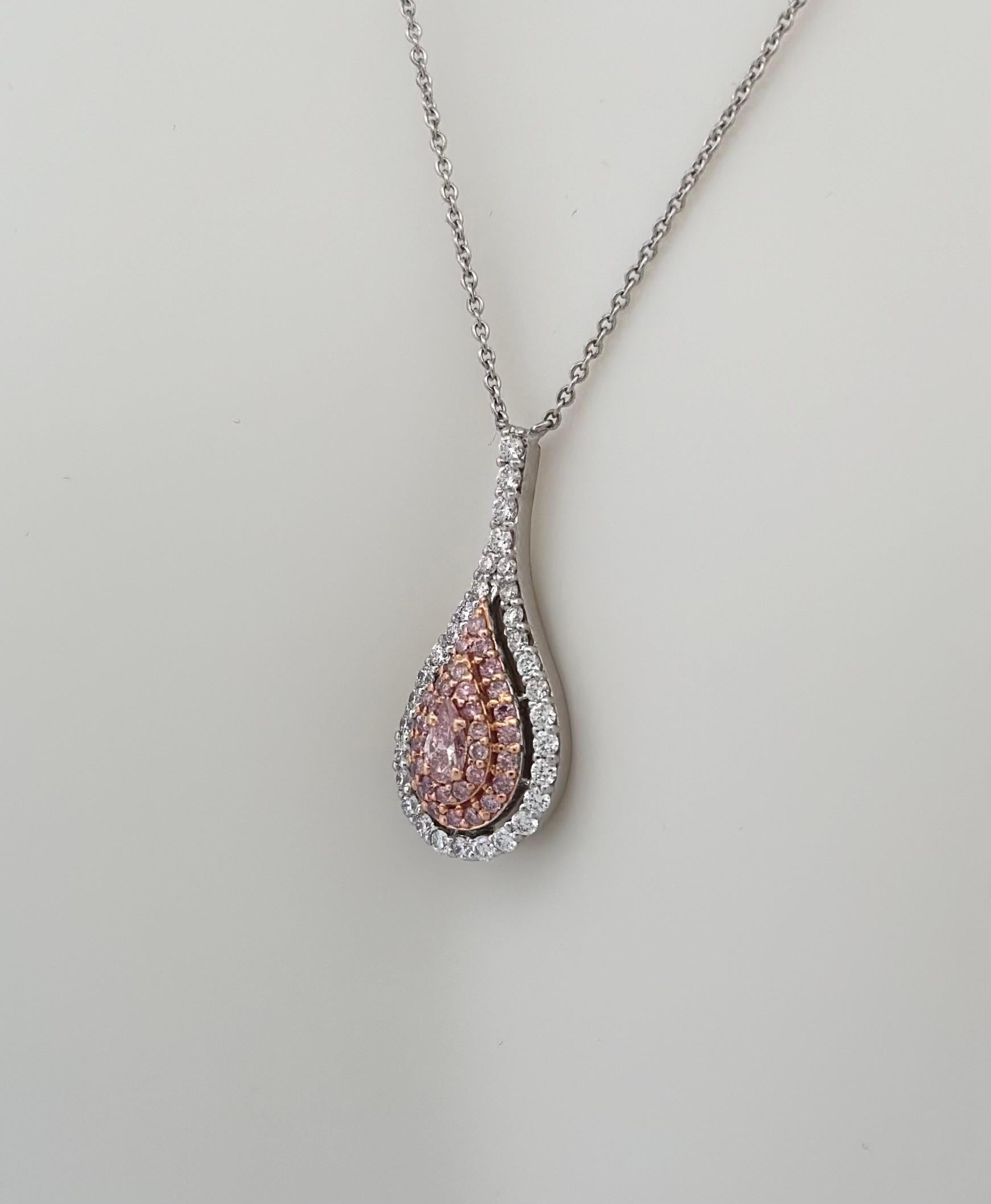 Experience the pinnacle of opulence and sophistication with our exceptional pendant chain. It is a stunning work of art that harmoniously blends the captivating allure of fancy pink diamonds with the timeless elegance of white diamonds.

At the