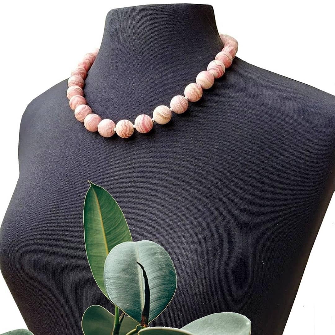 The length of the necklace is 21 inches (53 cm). The rare large size of the smooth round beads varies from 14 to 15.5 mm.
Natural rose-red rhodochrosite. Authentic, natural color not treated in any way. Superior higher grade! The beautiful,