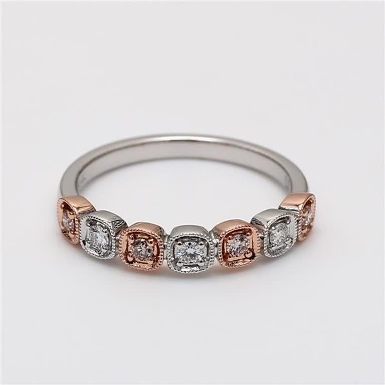 RareGemWorld's classic diamond band. Mounted in a beautiful 14K Rose and White Gold setting with natural round pink diamond melee complimented by natural round white diamond melee. This band is guaranteed to impress and enhance your personal