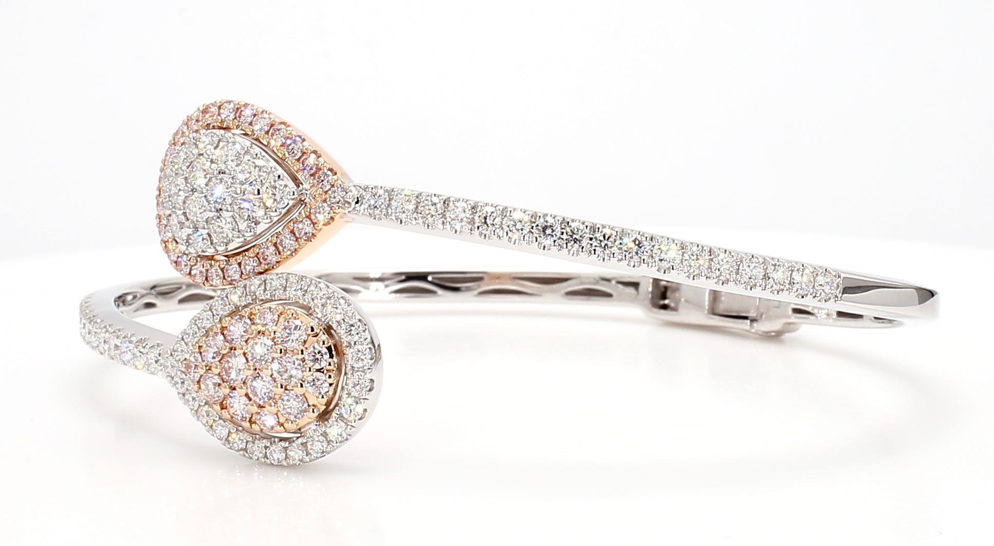 RareGemWorld's beautiful diamond bracelet. Mounted in a beautiful 18K Rose and White Gold setting with natural round cut pink diamond melee complimented by natural round cut white diamond melee. This bracelet is guaranteed to impress and will