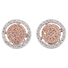 Clous d'oreilles en or rose naturel de 0.58 carat poids total