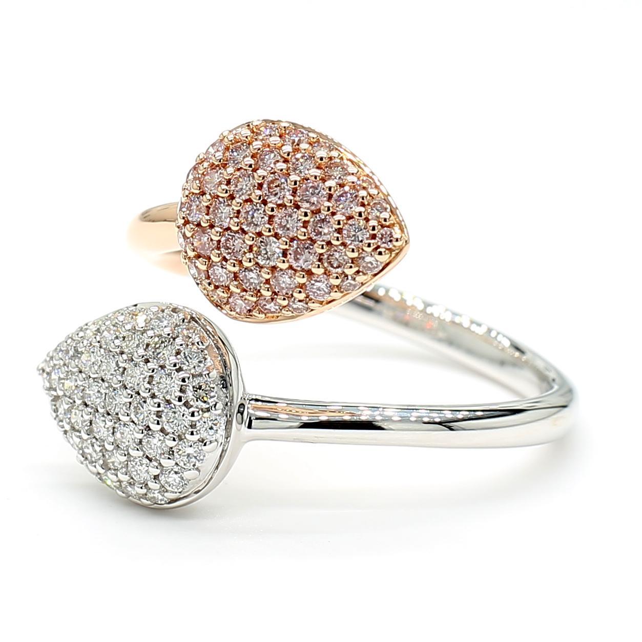 RareGemWorld's beautiful diamond ring. Mounted in a beautiful 18K Rose and White Gold setting with natural round pink diamond melee complimented by natural round white diamond melee. This ring is guaranteed to impress and enhance your personal