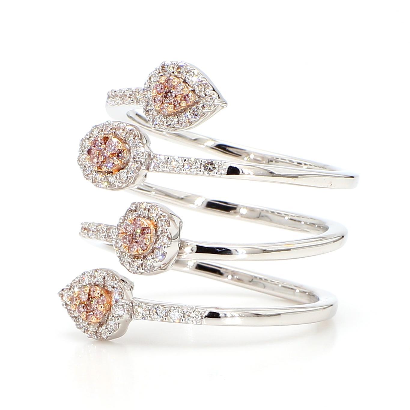 RareGemWorld's beautiful diamond ring. Mounted in a beautiful 18K Rose and White Gold setting with natural round pink diamond melee complimented by natural round white diamond melee. This ring is guaranteed to impress and enhance your personal