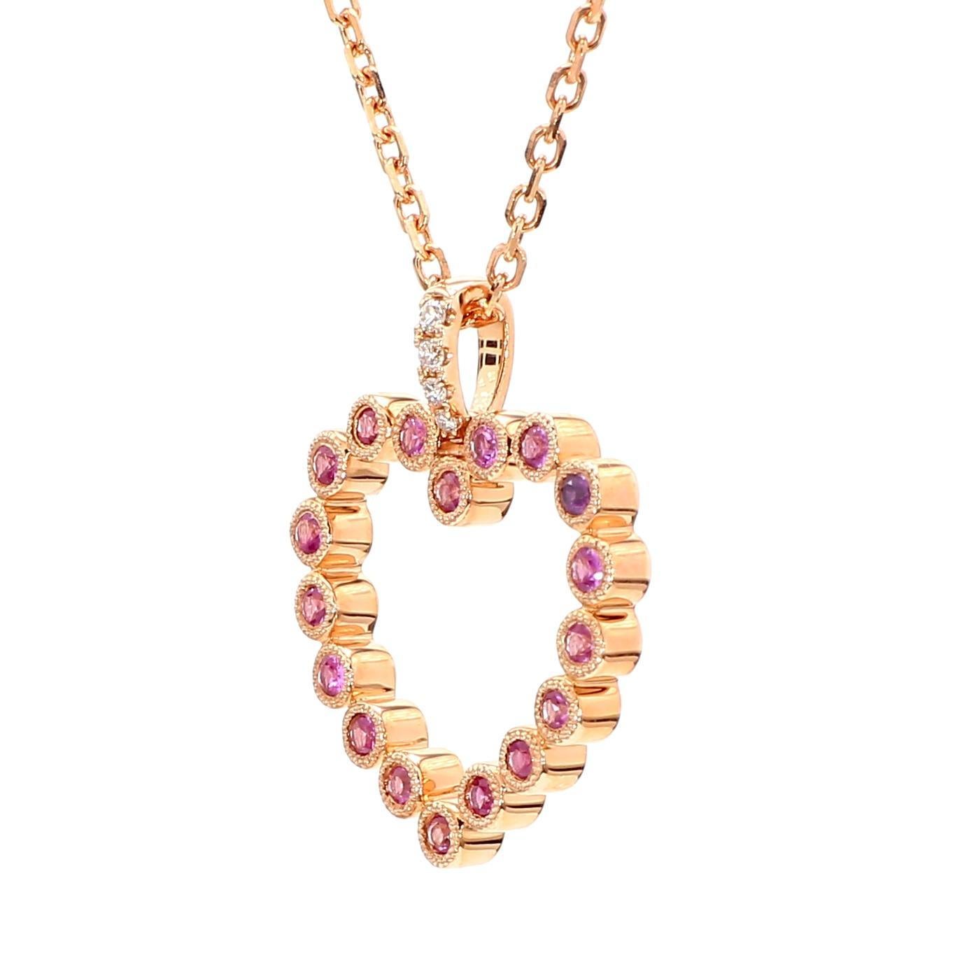 RareGemWorld's beautiful sapphire pendant. Mounted in a beautiful 14K Rose Gold setting with a natural round cut pink sapphires complimented by natural round cut white diamond melee. This pendant is guaranteed to impress and enhance your personal