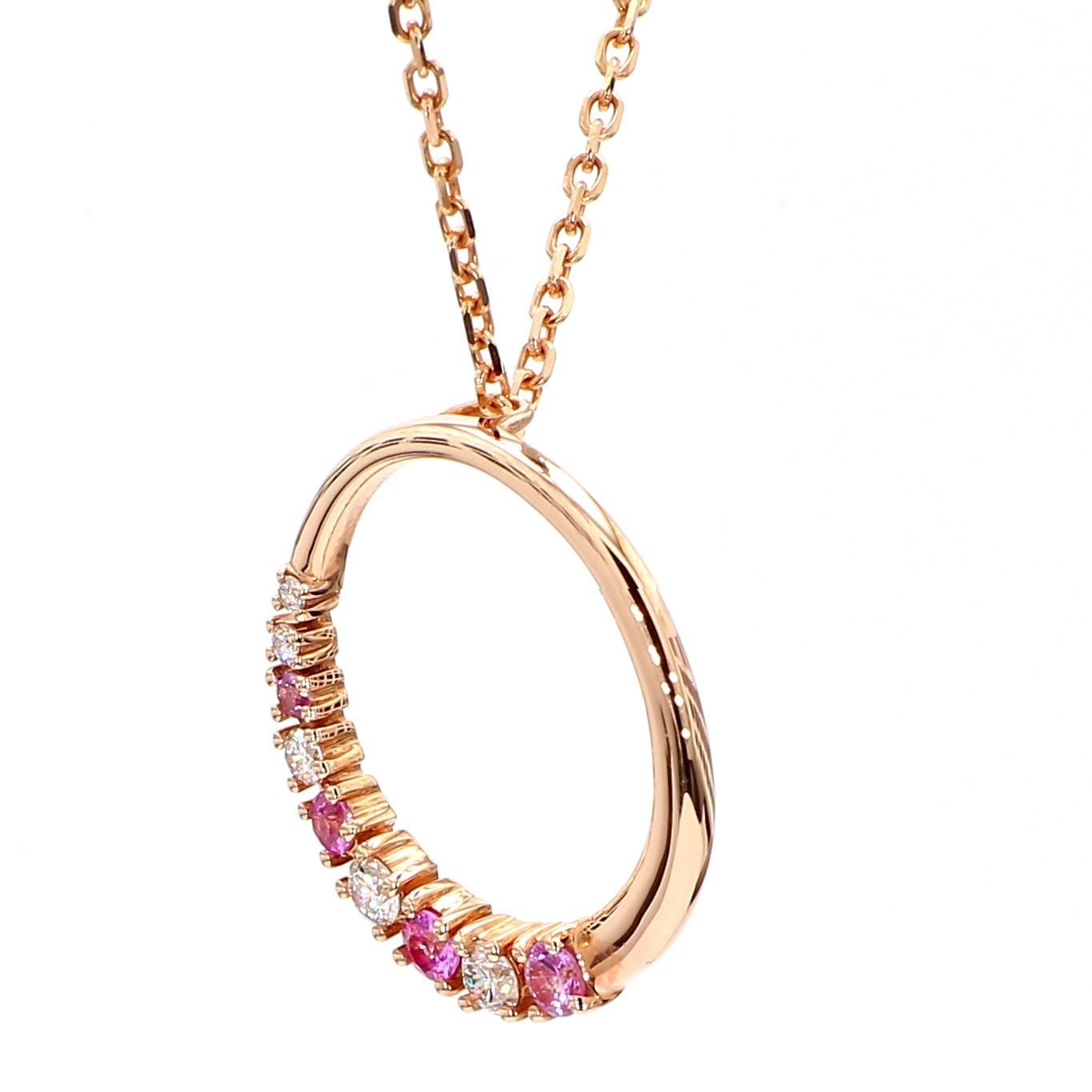 RareGemWorld's beautiful sapphire pendant. Mounted in a beautiful 14K Rose Gold setting with a natural round cut pink sapphires complimented by natural round cut white diamond melee. This pendant is guaranteed to impress and enhance your personal