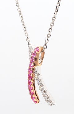 Anhänger aus Roségold mit natürlichem rosa rundem Saphir und weißem Diamant .65 Karat TW