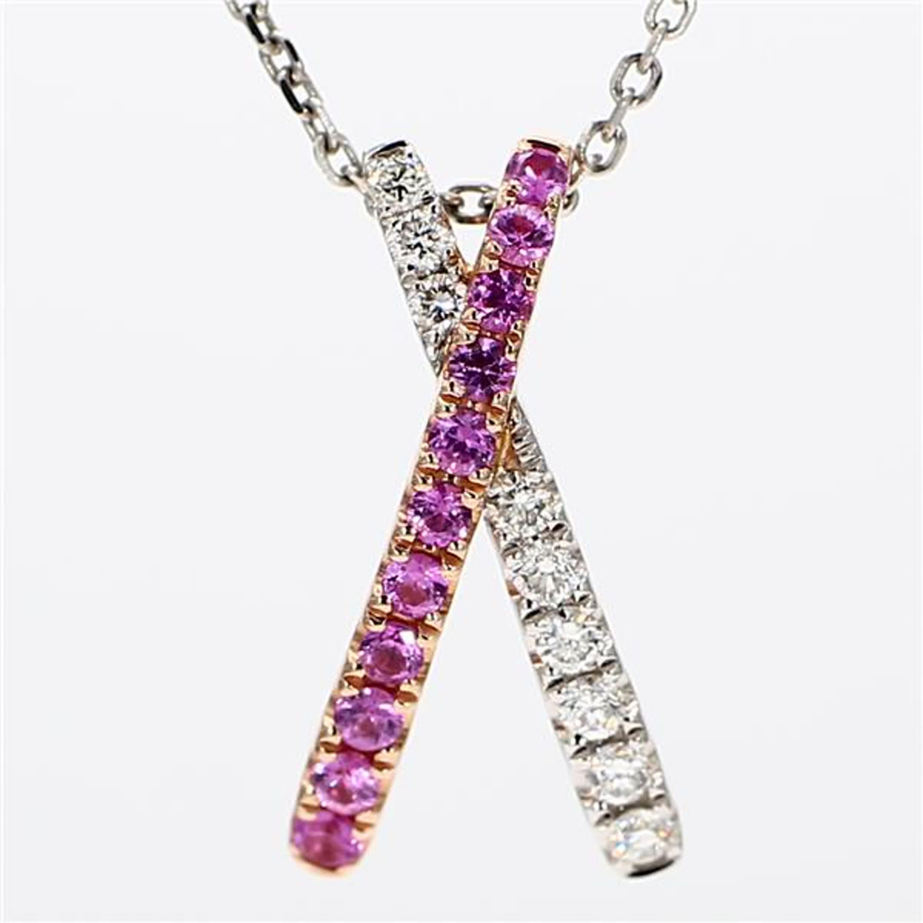 RareGemWorld's classic sapphire pendant. Mounted in a beautiful 14K Rose and White Gold setting with a natural round cut pink sapphires complimented by natural round cut white diamond melee. This pendant is guaranteed to impress and enhance your