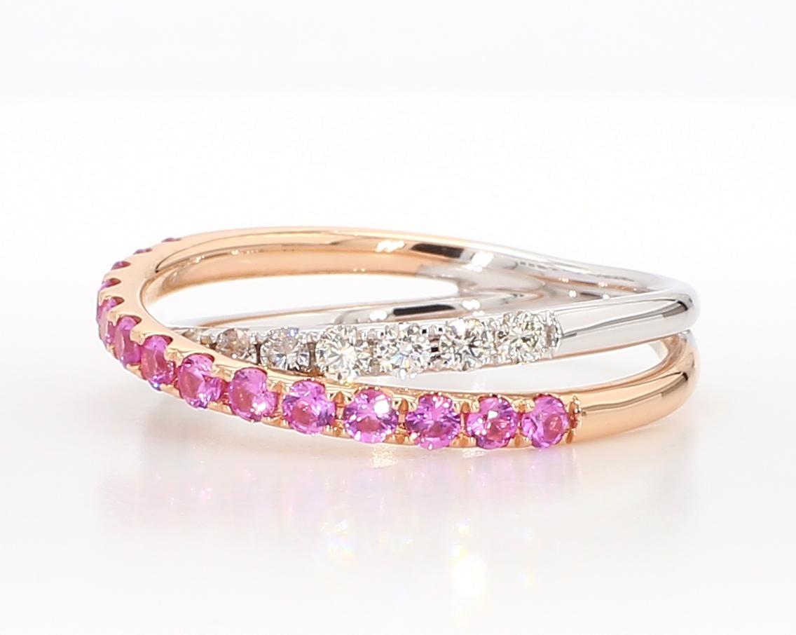 RareGemWorld's beautiful sapphire band. Mounted in a beautiful 14K Rose and White Gold setting with natural round cut pink sapphires complimented by natural round white diamond melee. This band is guaranteed to impress and enhance your personal