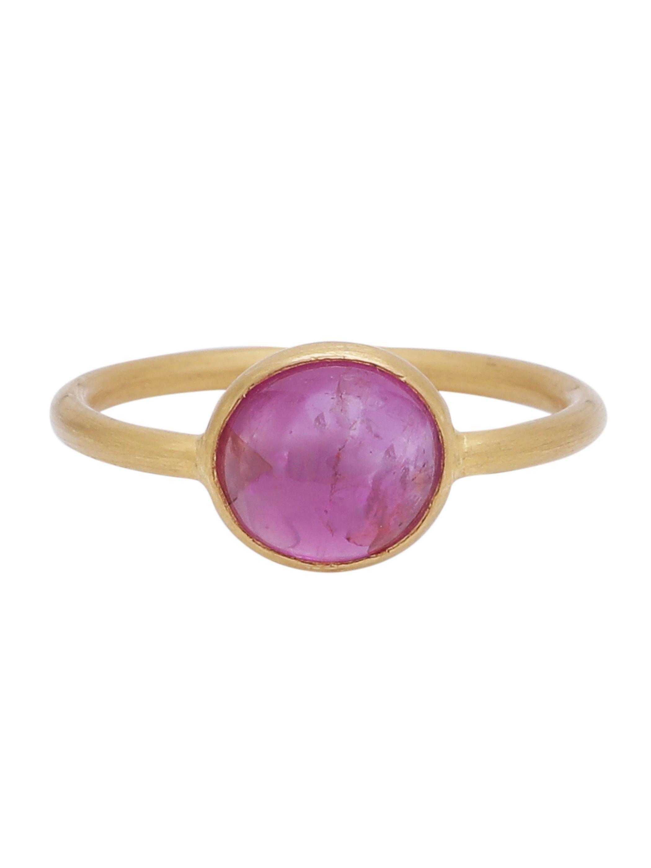 A Natural pink Ruby Cabochon delicately set in 22K matte finish yellow gold. The whole ring is Handcrafted by our skilled artisans.
Its a simple and delicate ring that can be worn alone or be stacked with other colours.
The Ruby in the ring weighs
