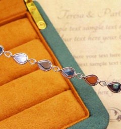 Natural Pink sapphire 4.08cts & Diamond 0.39cts Bracelet in 14k Gold