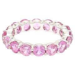 Natural pink sapphire band ring in 14k gold