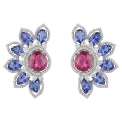 Orecchini con zaffiro rosa naturale, zaffiro blu e diamanti in oro 18 carati