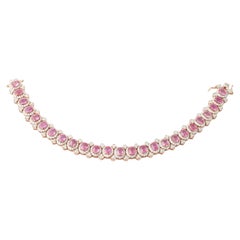 Armband aus 18 Karat Gold mit natürlichem rosa Saphir und Diamanten