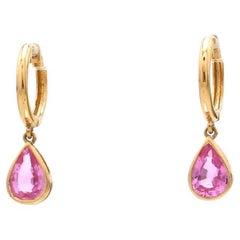 Natural pink sapphire earrings in 14k gold