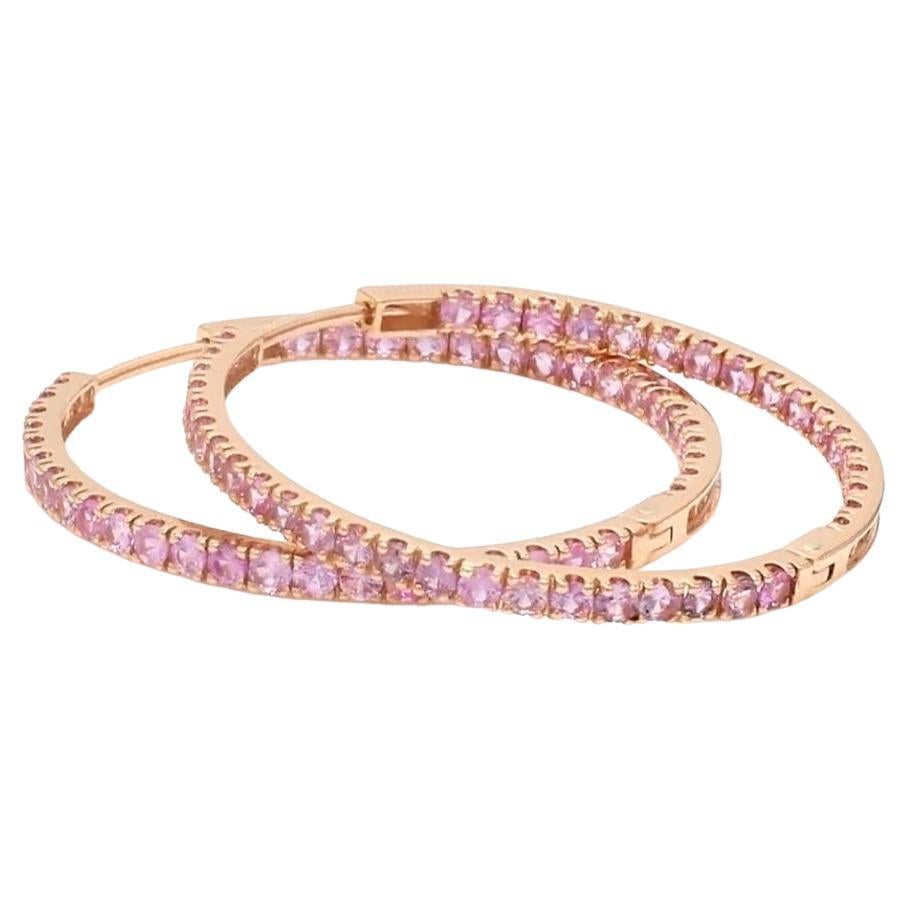 Natural pink sapphire earrings in 18k gold