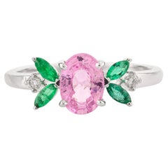 Anello con fiore di smeraldo e zaffiro rosa autentico in oro bianco 14 carati