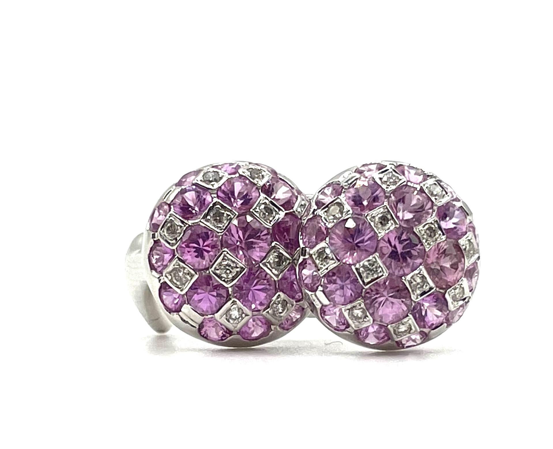 A pair of 18kt white gold, natural pink sapphire and natural diamond checkerboard earrings with straight post and omega clip system. Beautiful to wear on any occasion.

42 natural pink sapphires 3.30ct total weight

24 brilliant cut diamonds 0.26ct
