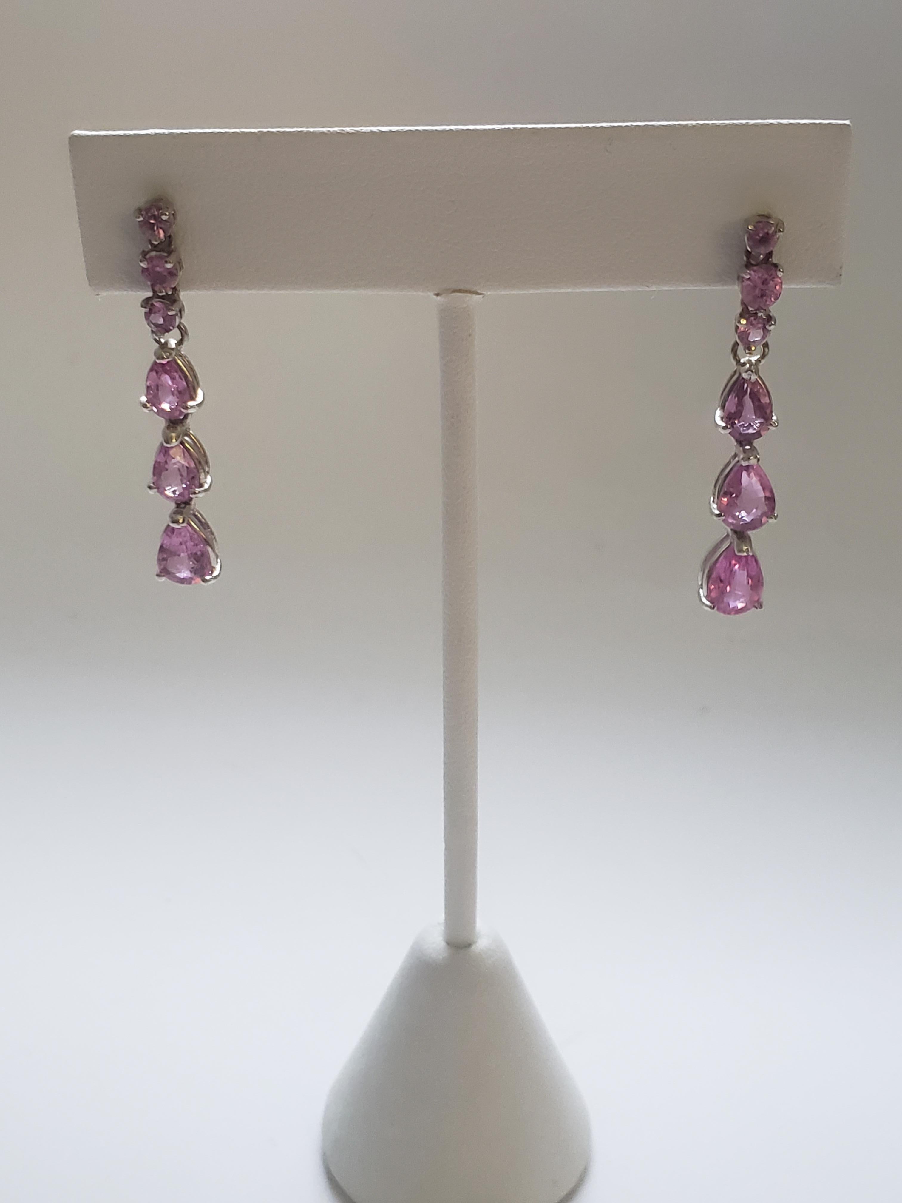 These stunning earrings are a beautiful addition to any jewelry collection. Crafted with 18k white gold and featuring natural hot pink sapphire stones, they exude beauty and elegance. The LaFrancee brand ensures that these earrings are of the