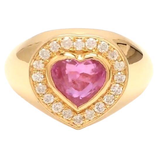 Natural pink sapphire ring in 18k gold