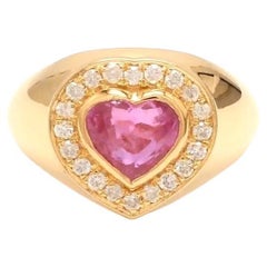 Natural pink sapphire ring in 18k gold