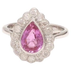 Natural pink sapphire ring in 18k gold