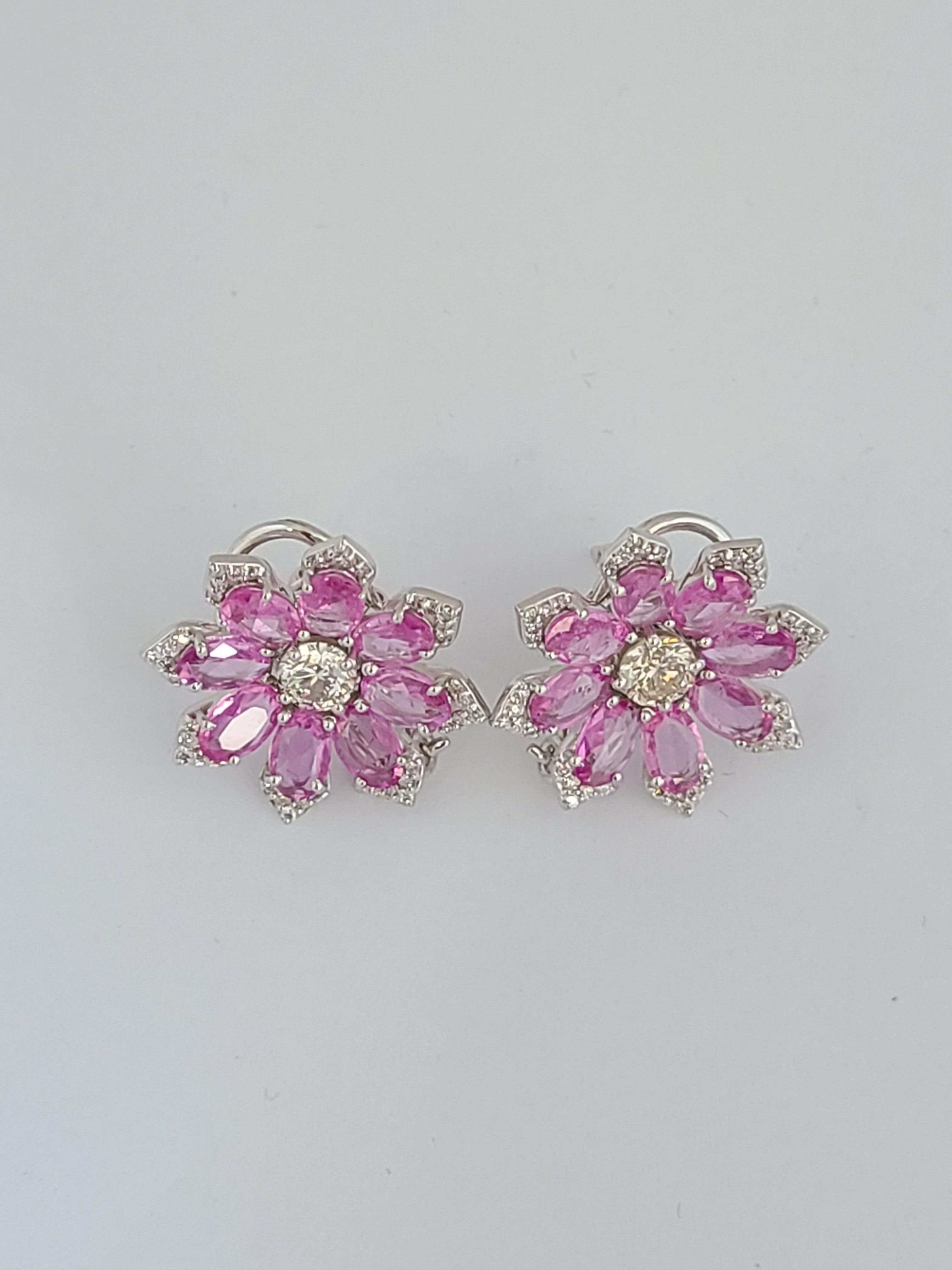 A pair of beautiful and chic studs set in 18k white gold with natural pink sapphires and diamonds. The pink sapphire weight is 5.98 carats and diamond weight is 1.43 carats. The studs dimensions in cm 2 x 2 x .3 (LXWXD).