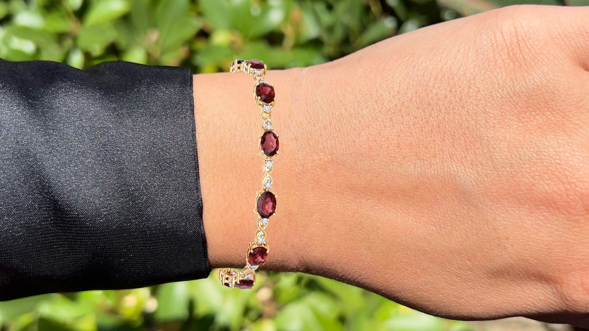 It comes with the appraisal by GIA GG/AJP
Pink Tourmaline = 8.40 Carats ( 7 x 5 mm )
Cut: Oval
Total Quantity of Tourmaline: 12
Primary Stone Color:  Pink
Diamonds = 0.35 Carats
Total Quantity of Diamonds: 24
Metal: 14K Yellow Gold
Bracelet Length:
