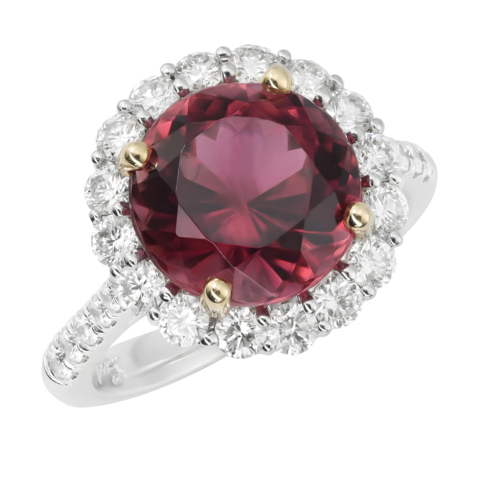 Erleben Sie die fesselnde Anziehungskraft des natürlichen rosa Turmalins mit diesem exquisiten Ring aus 14 Karat Weißgold. Ergänzt durch funkelnde Diamanten, zeigt dieses Schmuckstück außergewöhnliche Handwerkskunst und die strahlende Schönheit