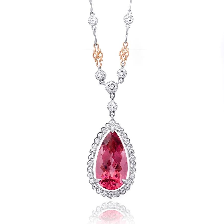 Discover the mesmerizing beauty of natural pink tourmaline with this exquisite pendant, masterfully crafted in platinum and 18K rose gold. This stunning piece, complemented by sparkling diamonds, showcases exceptional craftsmanship and the