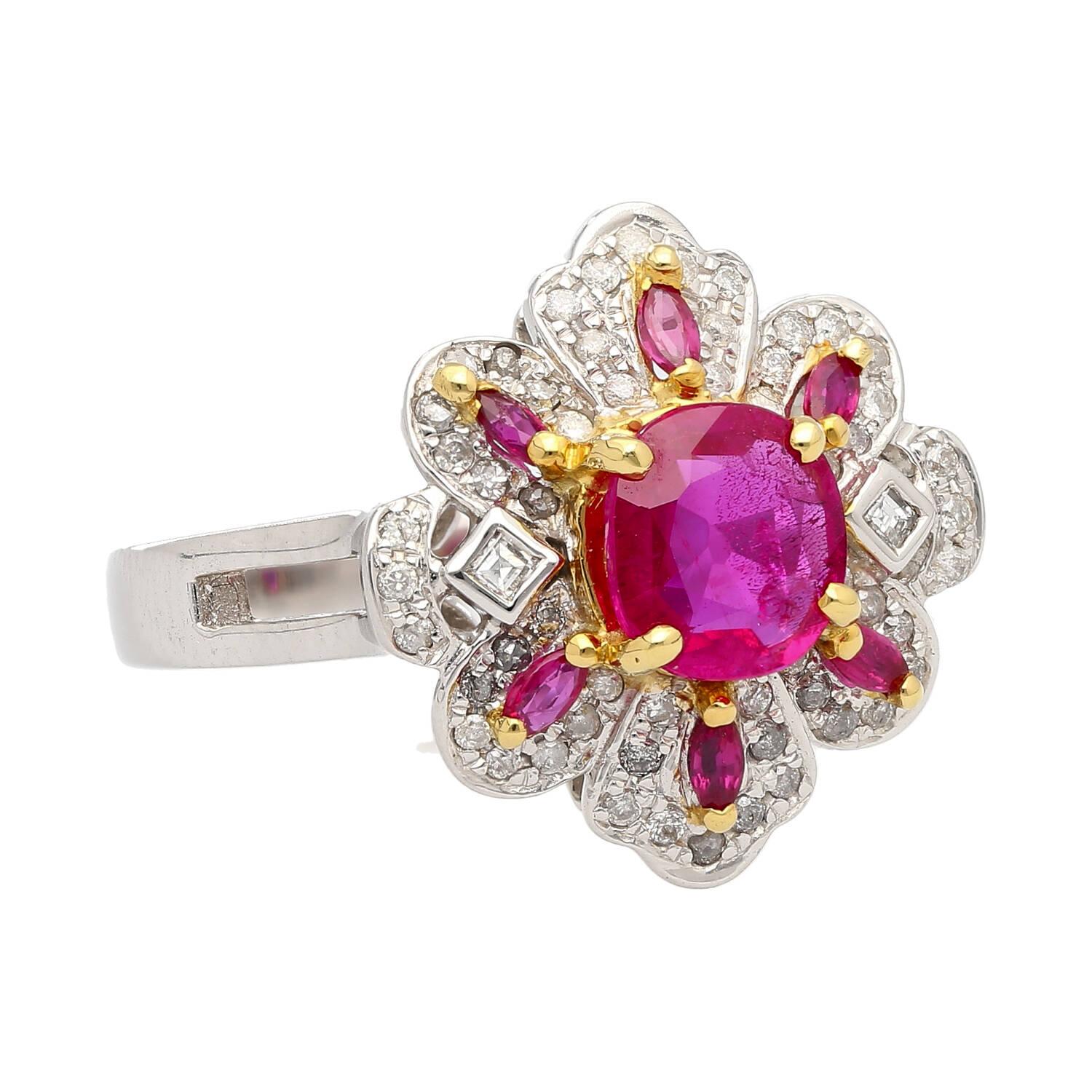0.91 carat round cut pinkish red color natural ruby in 14k white and yellow gold floral motif ring. The ring features a split open shank that contrasts well on the finger while worn. The center stone is full of life and displays a lustrous rich