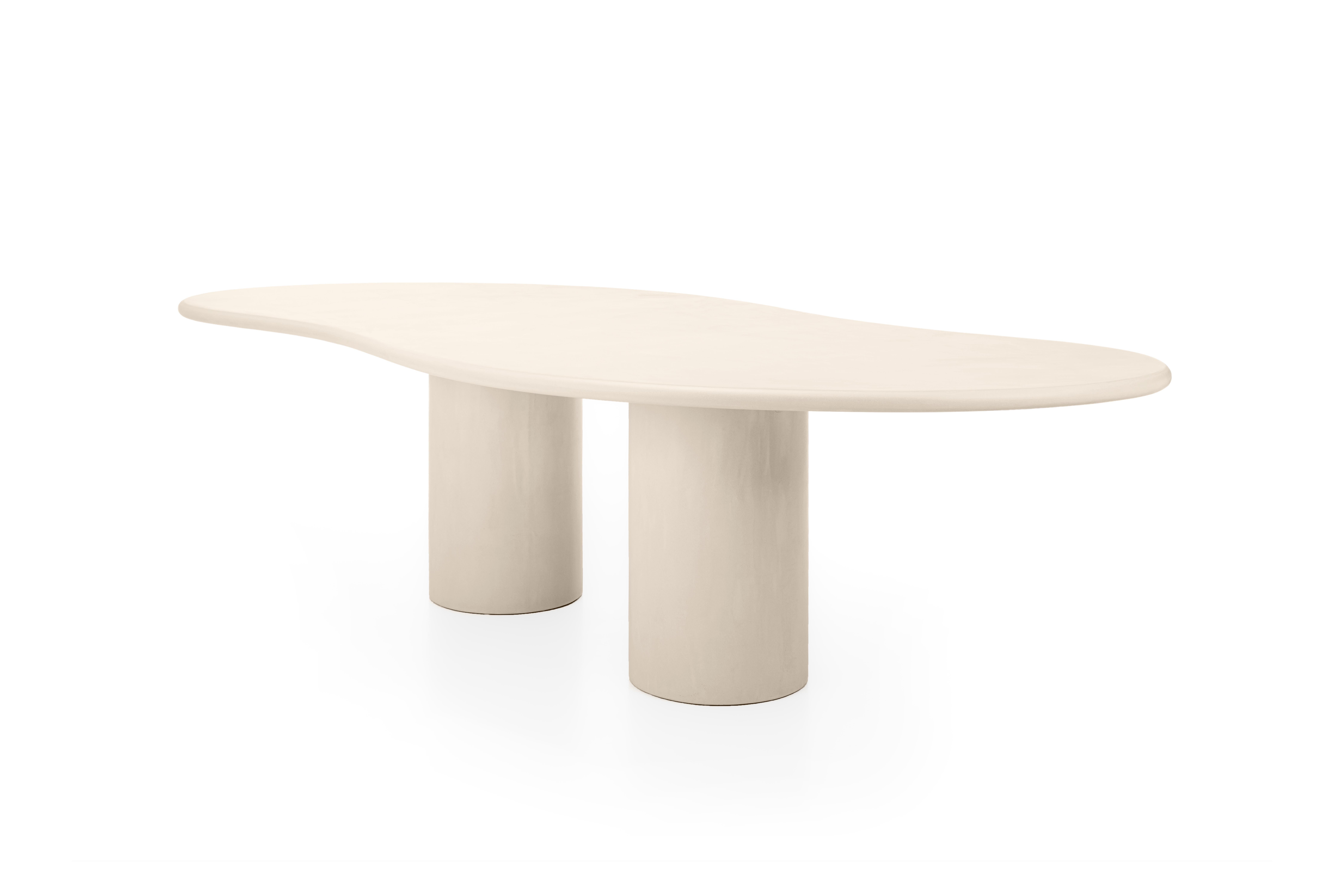 Contemporary Belgian design, handmade natural plaster table with a textured and earthy character.

Indoor use (price outdoor +10%)

Latin adjective “undulatus” / un . du la. tus / : wavy

The Latus dining table is handcrafted with multiple layers
