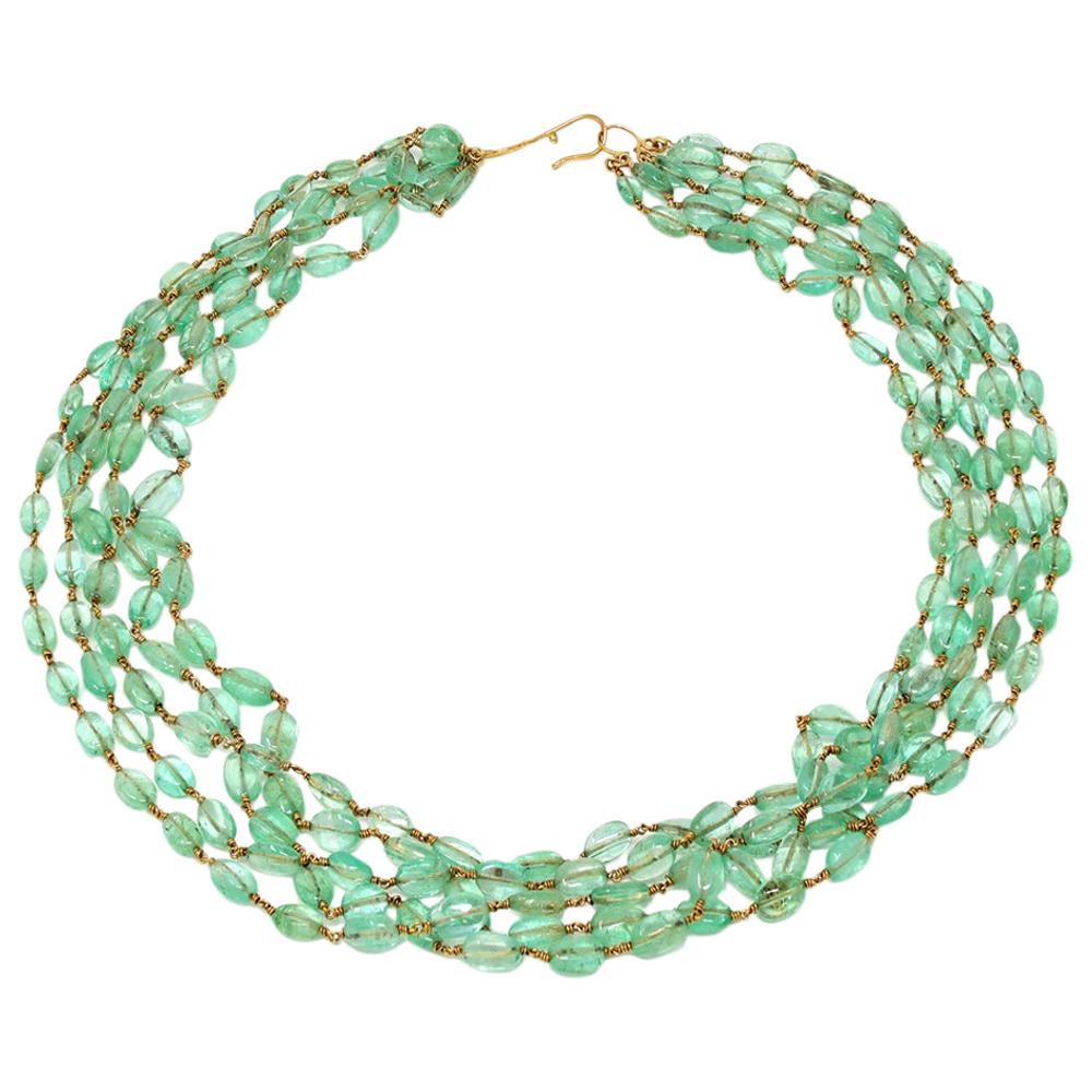 Natural Polished Emerald Beads Necklace Wired in 18 Karat Yellow Gold For Sale