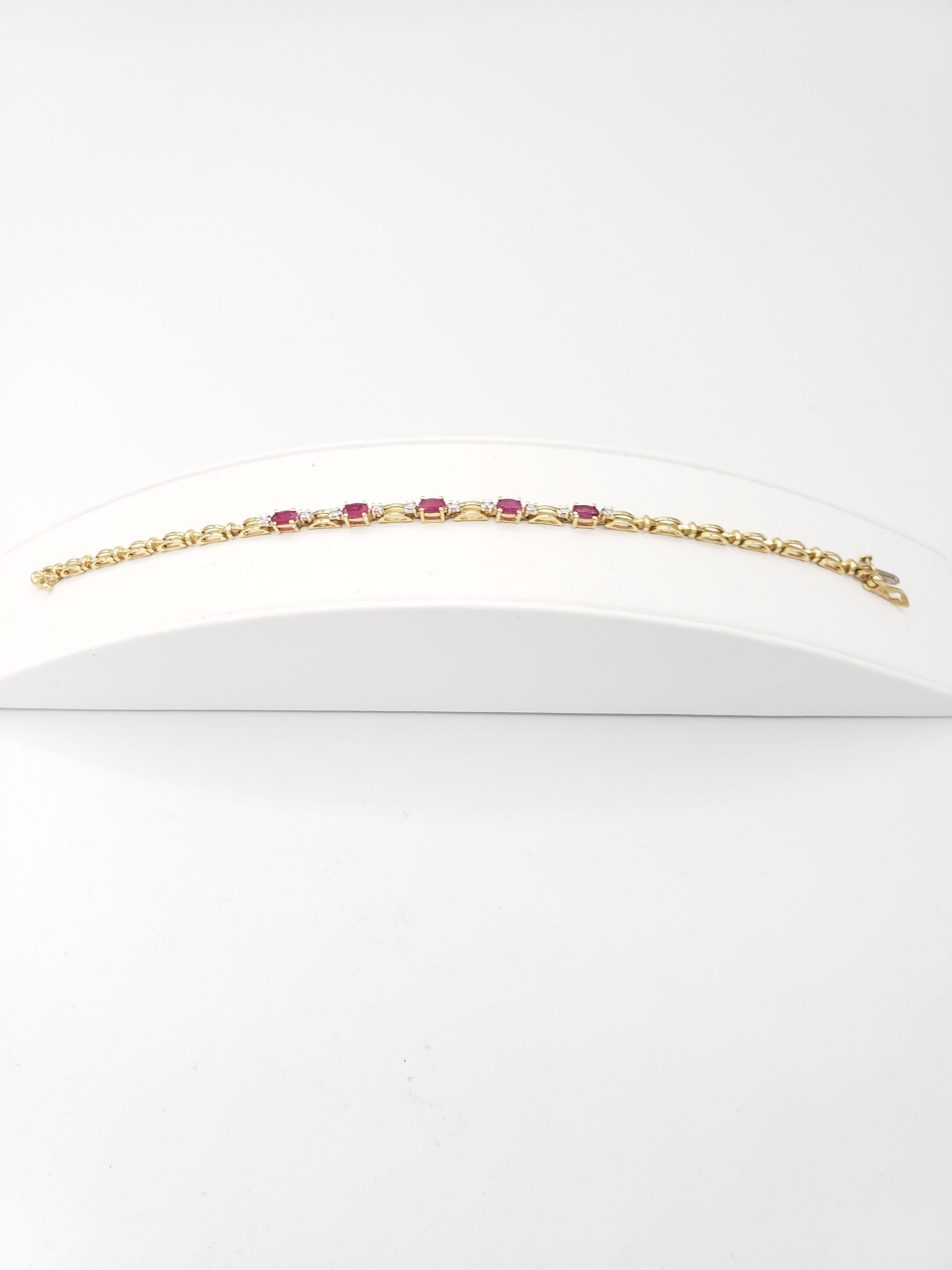 This stunning tennis bracelet is a true gem. Crafted with 14k solid yellow gold, it features natural rubies and diamonds that shine brilliantly with every movement. The length of the bracelet is 7 3/8 inches.

The beautiful yellow gold complements
