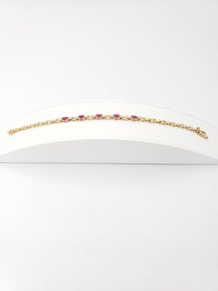 Pulsera «tenis» NUEVA de rubíes naturales y diamantes, en oro de 14k