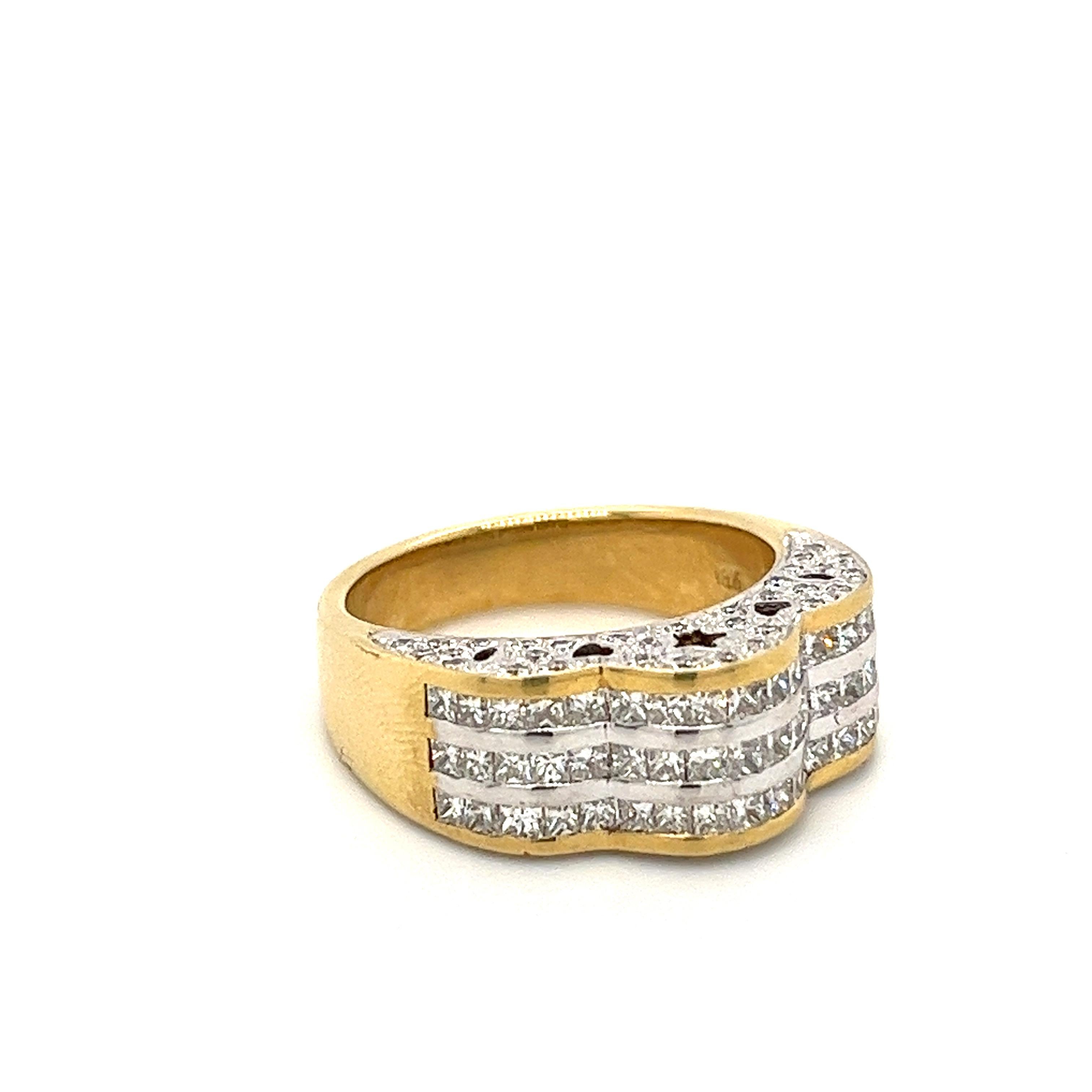 18K yellow gold ring set with 1.25 carats in princess and round cut natural diamonds. The princess cut diamonds are channel tension set, with a protective double-sided bezel for additional stability and sturdiness. 

The ring shank is beautifully
