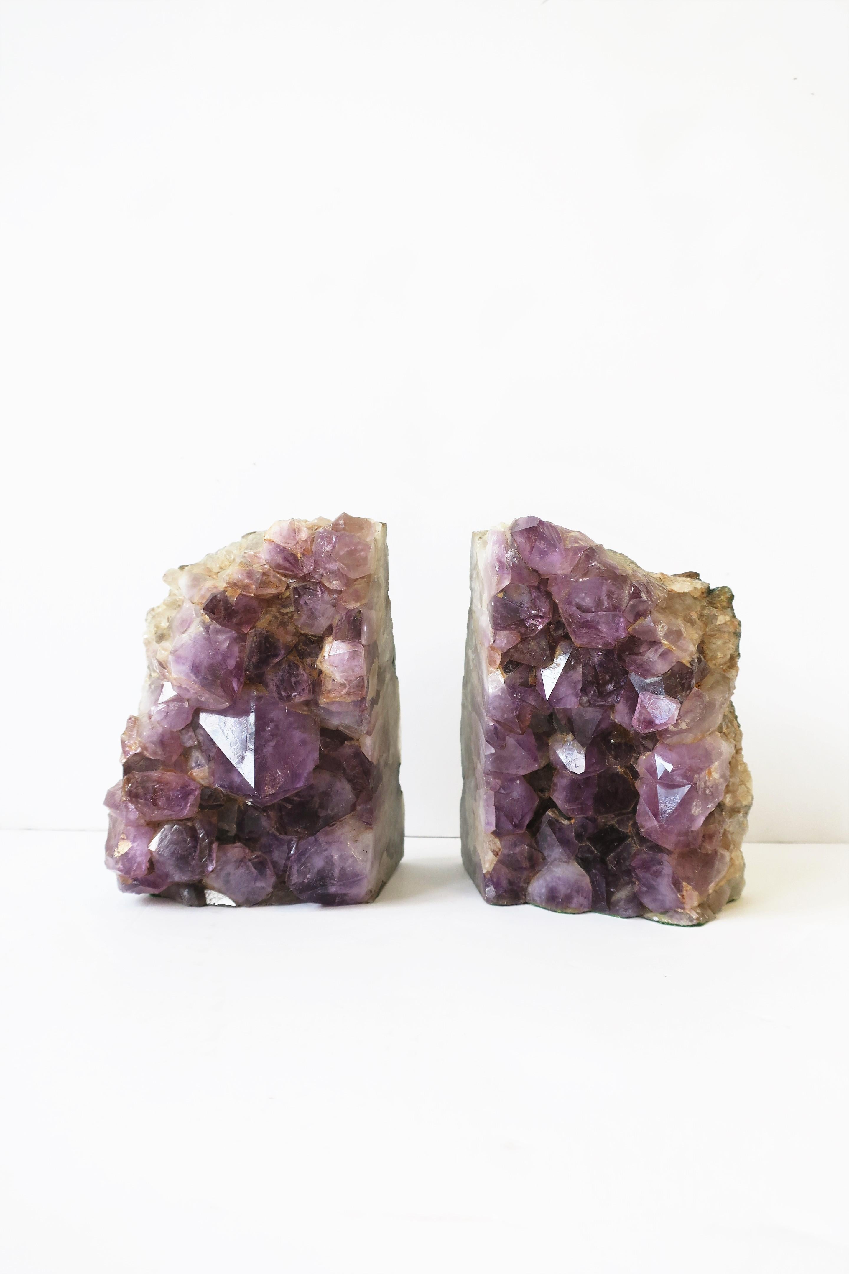 A beautiful and substantial pair of natural purple amethyst specimen bookends or sculptures/decorative objects, circa 20th century. Dimensions: 4