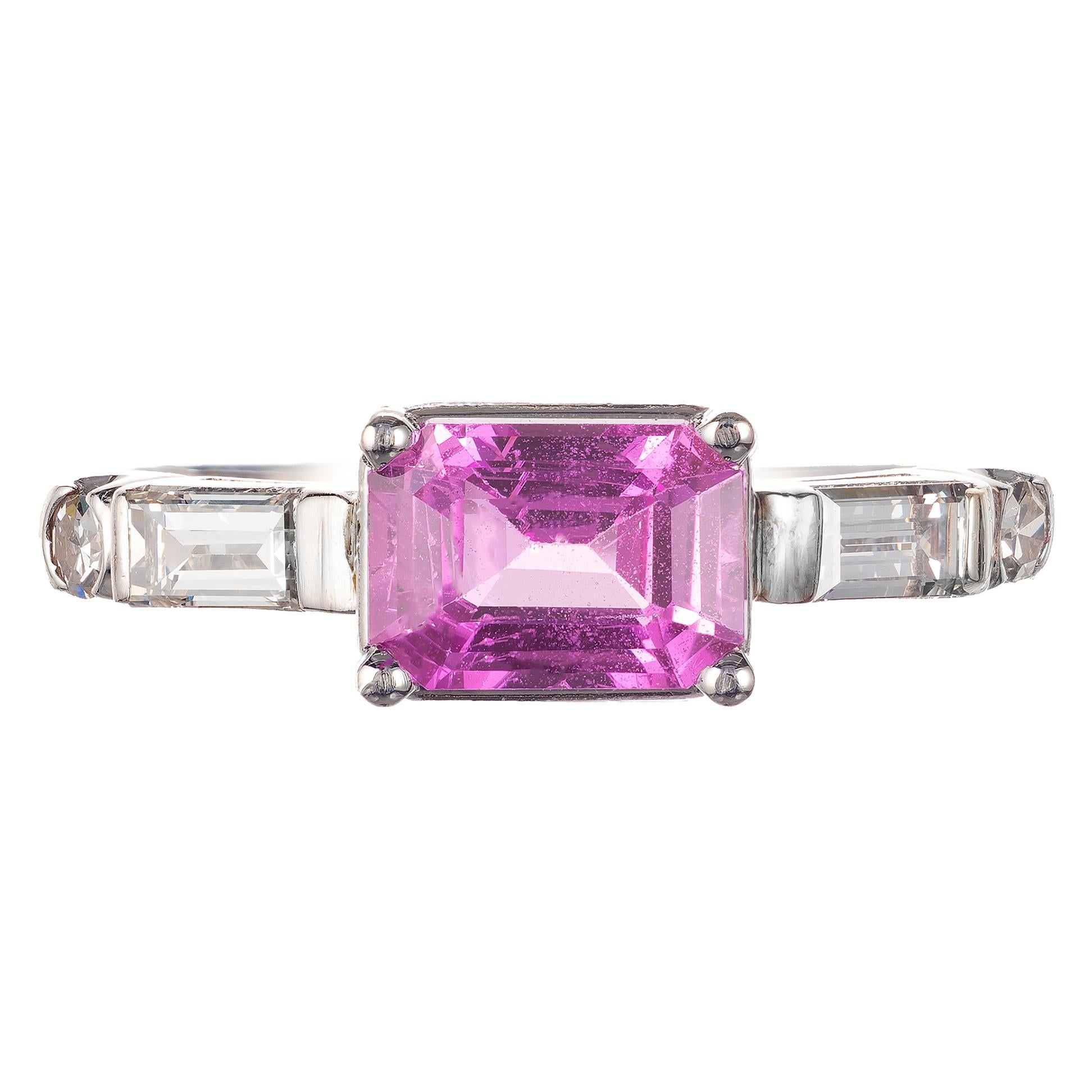 Mid-century 1940-1950 sapphire and diamond engagement ring. GIA certified natural no heat no enhancement purple pink Sapphire center stone in a platinum setting with two baguette and round accident diamonds. 

1 purplish pink octagonal Emerald cut