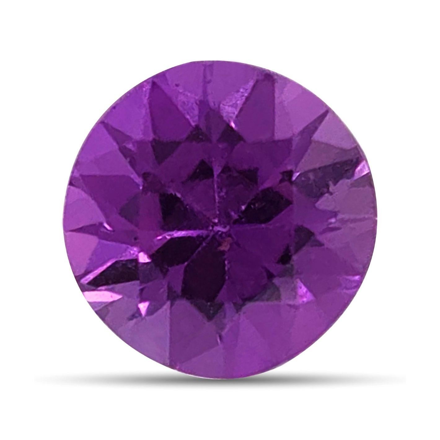 Discover the elegant beauty of this natural purple sapphire, weighing 0.88 carats. This gemstone's vibrant purple hue and expert craftsmanship make it an excellent choice for custom jewelry. 

Carat Weight: 0.88 carats, offering a delicate and