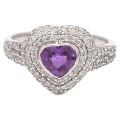 Natural purple sapphire ring in 18k gold