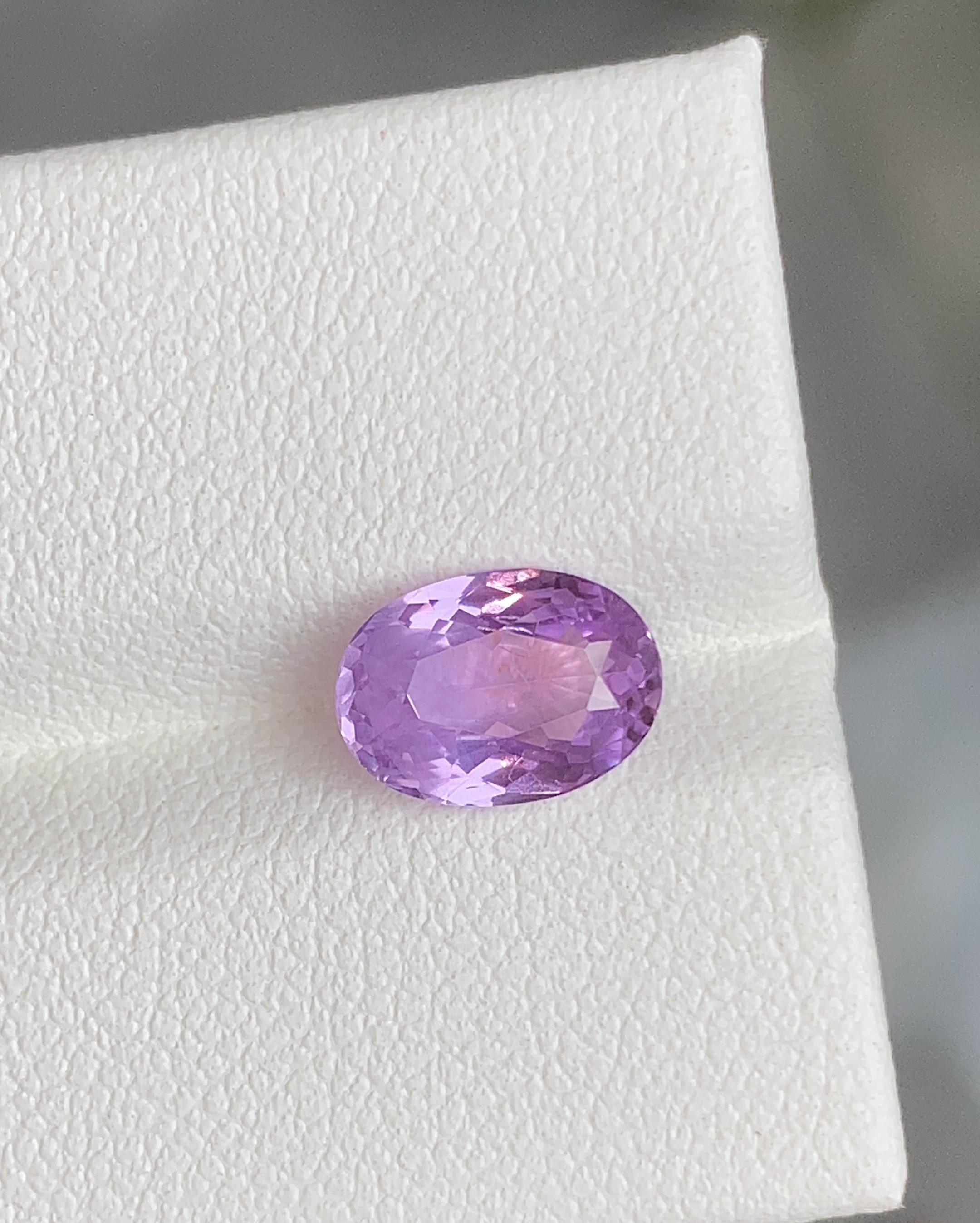 Ceylon Purple sapphire 2.10 Carats unheated comes with pretty purple color and luster and perfect cut, unheated 

• Variety: Sapphire
• Origin: Sri Lanka (Ceylon)
• Color(s): Purple
• Shape/Cutting Style: Oval
• Dimensions: 10.8mm x 7.6mm x 5.8mm
•