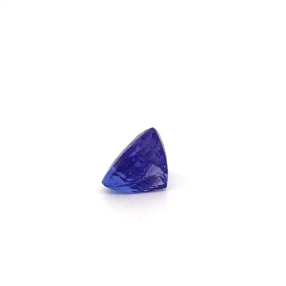 Specifications:

• Gemstone: Natural Tanzanite
• Weight: 4.45 carats
• Measurements: 10.11 x 9.99 x 7.2 mm
• Color: Strong Purplish Blue
• Clarity: Eye Clean (No Visible Inclusions)
• Cut:
 ✦ Crown: Brilliant-Cut
 ✦ Pavilion: Checkerboard Step-Cut
•