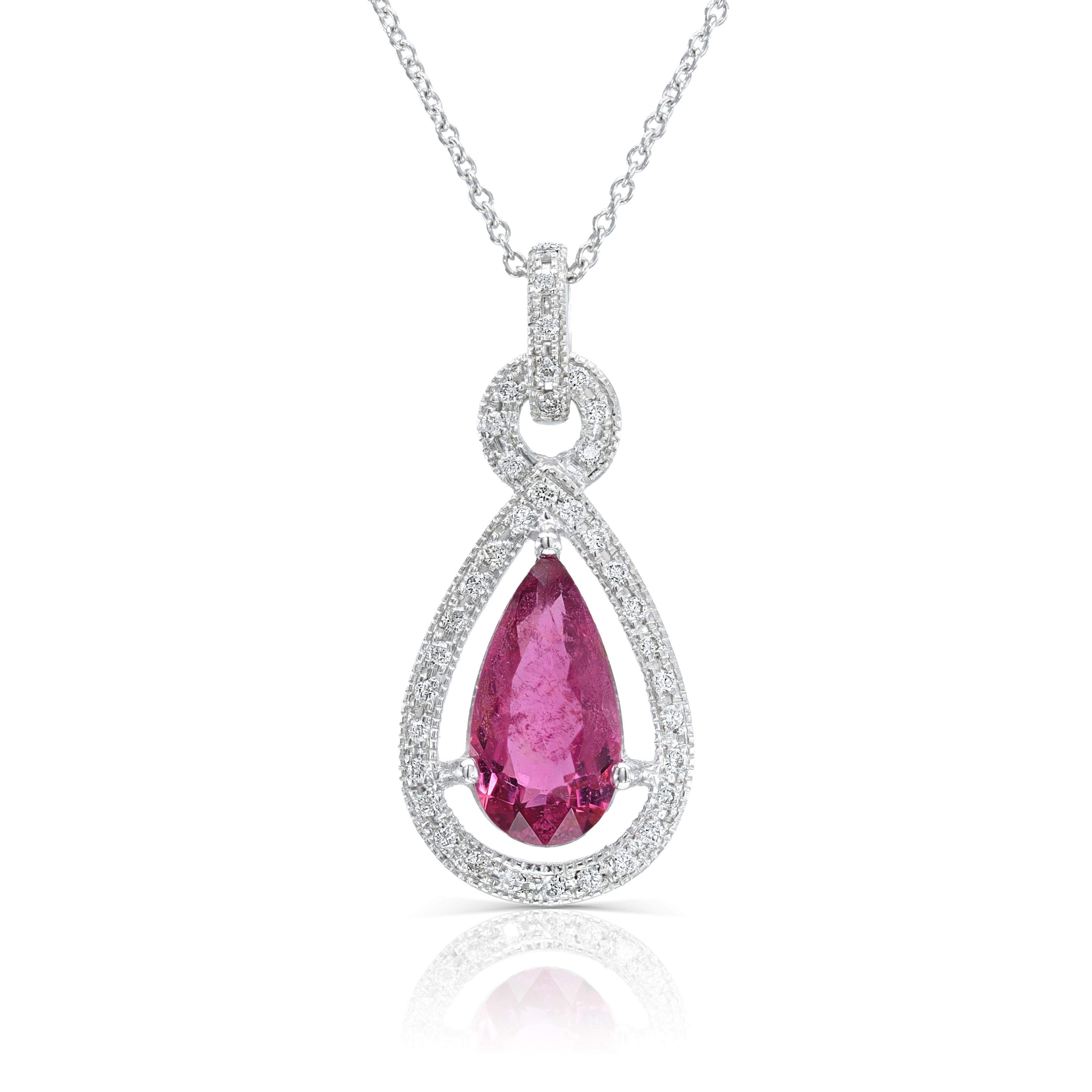 Discover the captivating elegance of natural purplish-red rubellite with this stunning pendant, beautifully set in 14K white gold. Complemented by sparkling diamonds, this piece showcases exceptional craftsmanship and the enchanting beauty of these