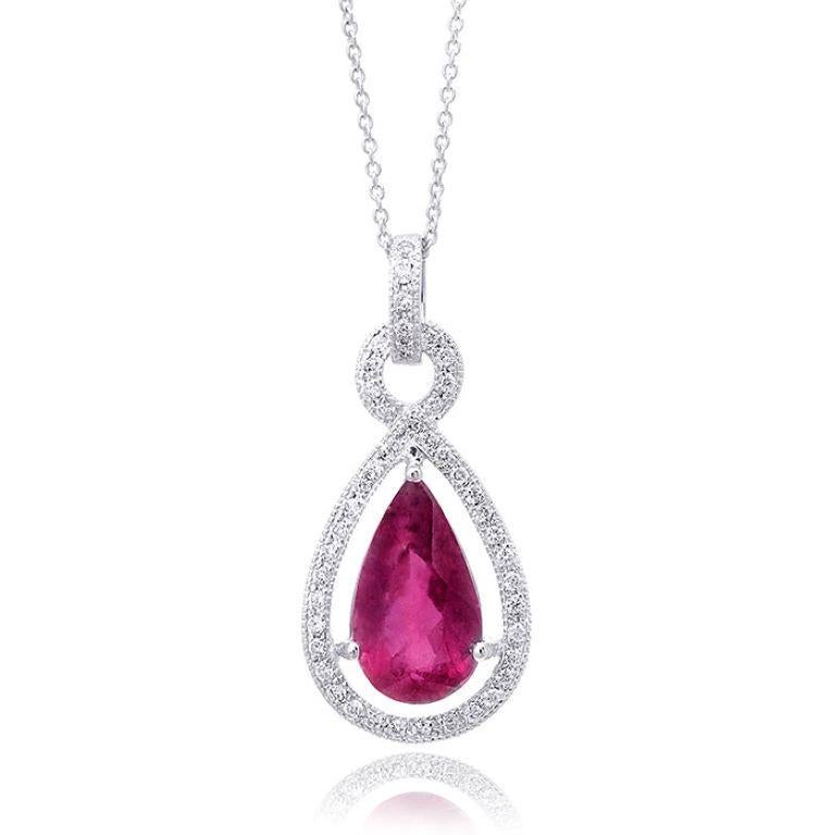 Discover the captivating elegance of natural rubellite with this stunning pendant, beautifully set in 14K white gold. Complemented by sparkling diamonds, this piece showcases exceptional craftsmanship and the enchanting allure of these precious