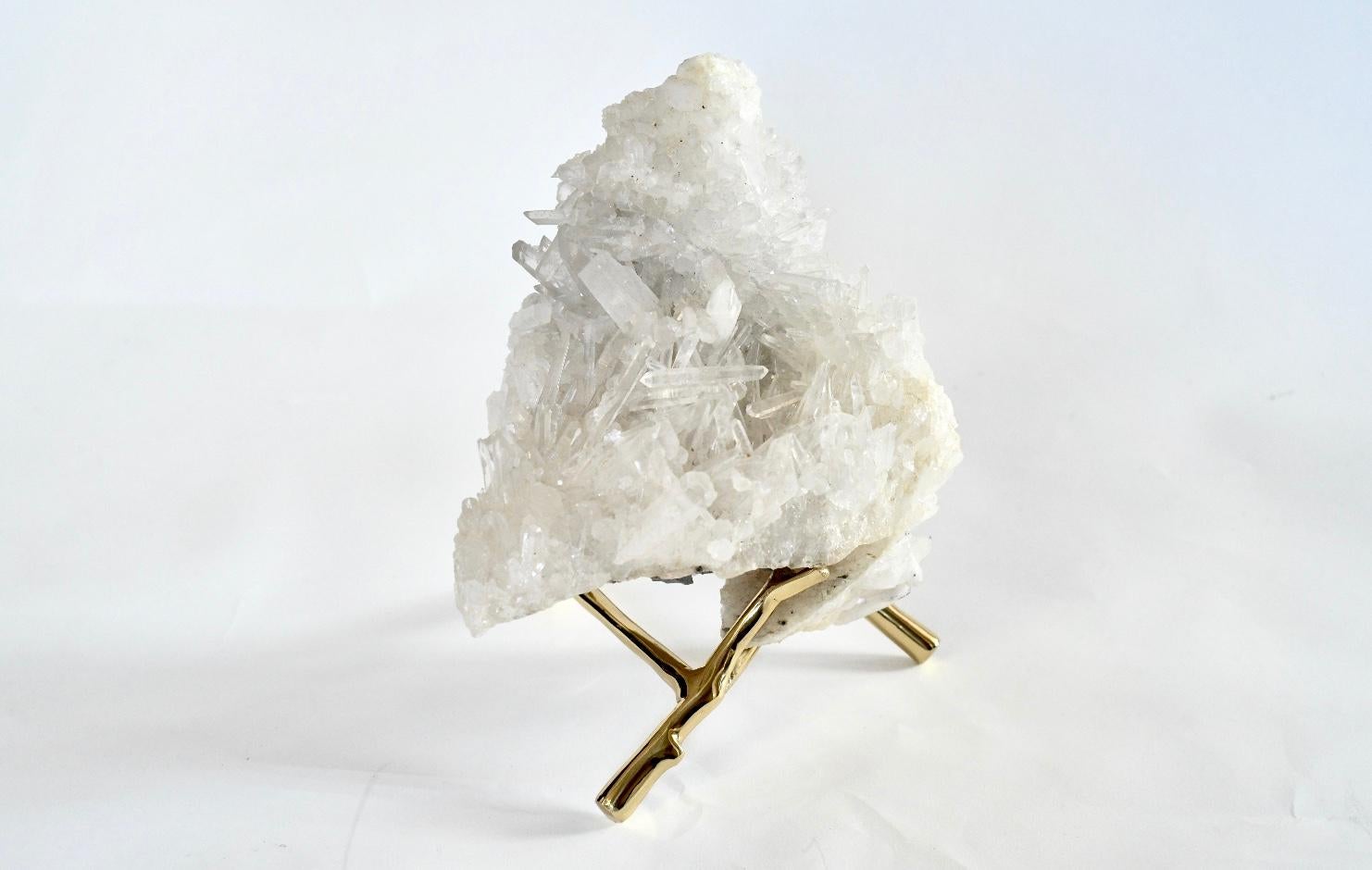 Natural quartz crystal sculpture with a stand.
The dimension of the crystal sculpture: 9